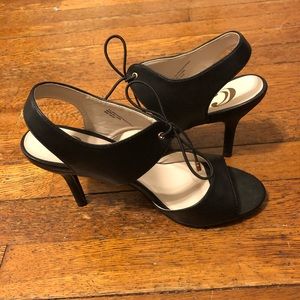 Black peep toe heels with open back